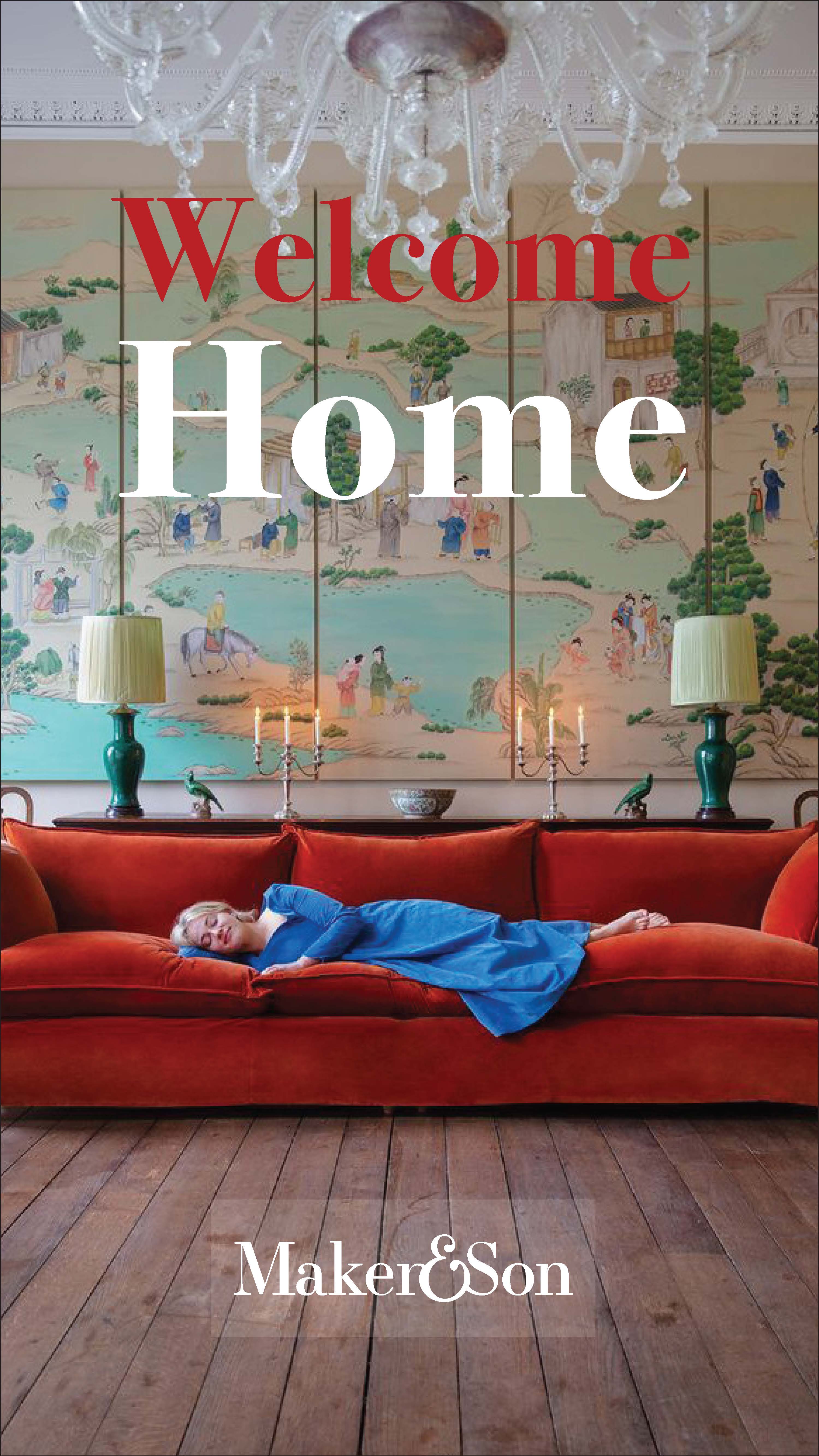 A woman lays on a long red velvet couch in front of a mural.